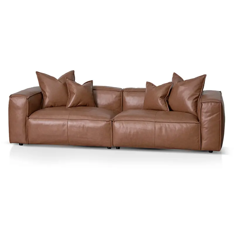 Caramel Brown Four-Seat Sofa With Cushions & Pillows 1
